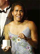 Cathy Freeman of Australia holds her award at the 2003 World Athletics Gala in Monaco