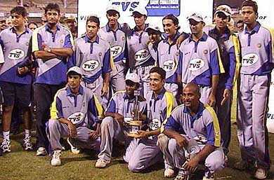 The victorious India �A� cricket team poses for a photograph with the Challenger Trophy after they defeated India �B� team