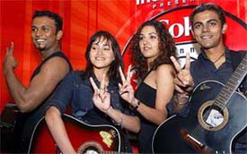 Members of Popstars 2, the musical group selected by channel V following a nationwide search, flash victory signs in New Delhi 