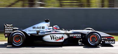Mclaren Formula One driver Kimi Raikkonen takes a test drive at the Montmelo racing circuit outside Barcelona