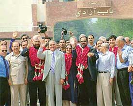 The Indian Olympic Association delegation led by Mr Suresh Kalmadi and Mr Randhir Singh being warmly received by members of the Pakistani Olympic Association
