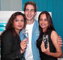 Models Nisha and Cleo join Adam Bedi at the launch of L'eauparkenzo, a new perfume from Kenzo