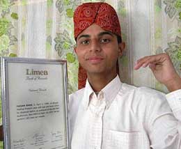 Nineteen-year-old Faizaan shows the certificate which he received from the Limca Book of Records