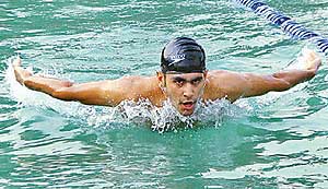 Harsimran Brar, winner of 100-metre freestyle, in action during the Chandigarh Swimming Championship being held at Panjab University swimming pool 