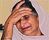 A Kashmiri Sikh woman wails over the death of her son