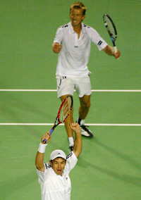 Australia�s Todd Woodbridge and Wayne Arthurs celebrate their victory over Switzerland�s Roger Federer and Marc Rosset 