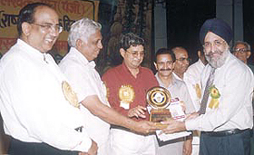 GHPS India Gate Principal Inderjit Singh Narang receiving Dr Radhakrishanan Memorial National Teachers' Award from the All India Freelance Journalist and Writers Association for his contribution in education, literature, art and heritage.