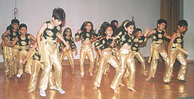 Ecstatic schoolchildren having a ball.