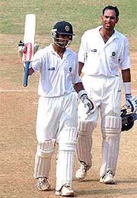 Rest of India's Rahul Dravid acknowledges his century on the fourth day of the Irani Trophy match against Mumbai in Chennai 