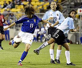 Japan's Mio Otani scores against Argentina at the Women's World Cup in Columbus, Ohio