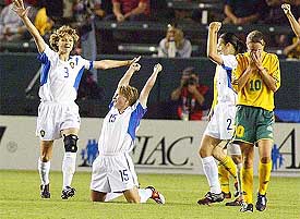 Members of the Russian team celebrate their victory over Australia at the Women's World Cup