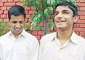 Visually impaired Mandeep Singh and Manglesh Kumar are all smiles as they talk of their expectations from the President�s visit at the Institute of Blind, Sector 26, Chandigarh, on Tuesday.