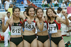 Thai athletes celebrate after winning the 4x100m relay final during the last day of the 15th Asian Athletics Championships