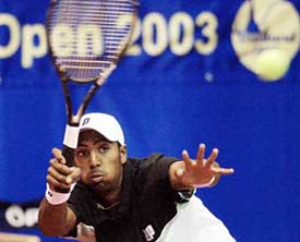 Prakash Amritraj hits a forehand during his first round Thailand Open match against Nicolas Thomann of France at Impact Arena in Bangkok on Wednesday 