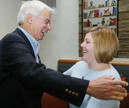 Elizabeth Jordan Carr, America�s first test tube baby, now 21 and a senior at Simmons College, embraces her birth delivery doctor Fredrick Wirth of King Prussia