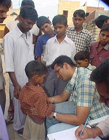 A team of doctors examines gastroenteritis patients of Giaspura village