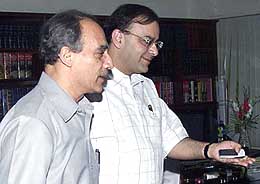 Union Law Minister Arun Jaitley (R) with   Disinvestment Minister Arun Shourie before their meeting on disinvestment issues of HPCL and BPCL