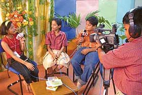 Students of Ryan International School record an interview scene