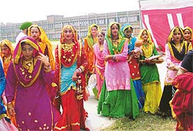 Students of Nankana Sahib Public School, Ludhiana, wait to take stage at the silver jubilee function