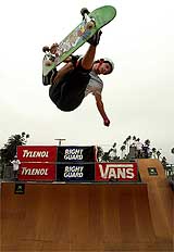 Professional skateboarder Bucky Lasek of the US flies off the top of the vertical ramp during a practice session for the Xbox World Skateboard championships in California