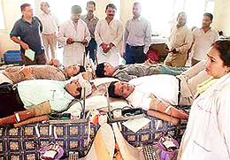 People donate blood at a camp organised by the Aggarwal Sabha at Aggarsain Bhavan in Sector 30, Chandigarh, on Sunday.