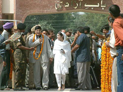 Mr Arif Choudhary, leader of a 22-member Pakistani delegation of legal luminaries, crosses the Indo-Pak joint checkpost at Wagah
