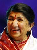 Melody queen Lata Mangeshkar smiles at a gathering which celebrated her 75th birthday, in Mumbai on Sunday