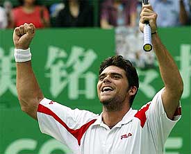 Mark Philippoussis of Australia celebrates after winning the Shanghai Open in Shanghai 