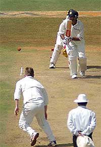 Yuvraj Singh plays a defensive shot on the third day of the match between Board President's 11 and New Zealand