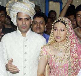Karisma with groom Sunjay Kapoor after their wedding at Deonar cottage in Chembur