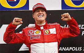 Ferrari driver Michael Schumacher of Germany celebrates after winning the United Stated Grand Prix in Indianapolis 