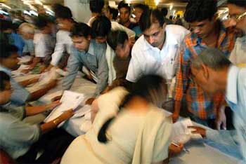 Tax payers line up to submit their income tax returns