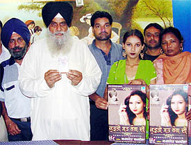 Mr Jagdev Singh Jassowal, Chairman, Professor Mohan Singh Foundation, releases a cassette of Kamaljot Chamkila