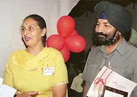 Mrs Harkiran Bali and Mr Charanjit Singh, who have donated blood 56 and 142 times, respectively, being honoured at an annual awards function of the Blood Bank Society, Chandigarh