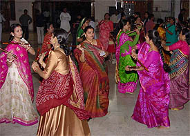 Gujarati community members perform Dandia to celebrate Navratras at Lakshmi Narayan Temple