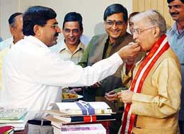 Human Resource Development Human Resource Development Minister Murli Manohar Joshi being welcomed in his office