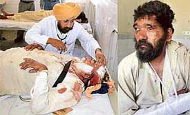 A dera granthi, who was attacked by robbers, being treated by a doctor at the Civil Hospital, Kharar; Rakesh, alias Subedar