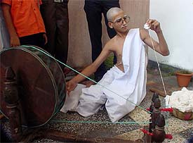 A student of SDP School weaves khadi on the birth anniversary of Mahatma Gandhi