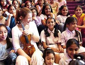 World's foremost young violinist, Janine Jansen, interacts with schoolchildren