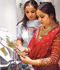 Visitors admire jewellery at Swarn Sambandh, an exhibition of jewellery organised by the World Gold Council at Hotel Shivalikview, Sector 17, Chandigarh, on Friday.