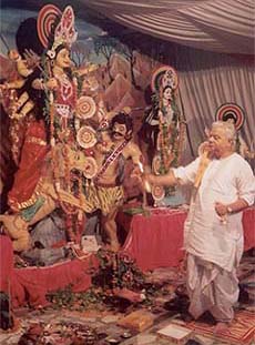 A Bengali priest performs Durga Puja in Ludhiana