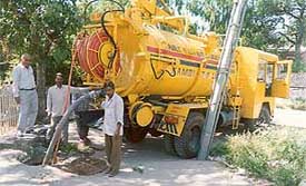 A sewerage cleaning machine removes a blockage in Kalka