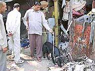 The anti-sabotage team along with trained dogs inspects the site of the blast at Old Panchkula