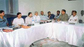 Entrepreneurs of the Mandi Gobindgarh focal point discuss a problem with government officials.