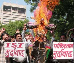 Activists of the All-India Anti-Terrorist Front burn the effigy of terrorism on the eve of Vijay Dashmi at Jantar Mantar in New Delhi on Saturday.