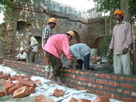 The boundary wall under construction at the "samadh" of Sardar Jassa Singh Ahluwalia in Amritsar
