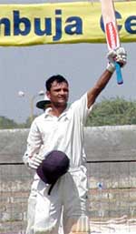 India's A Hemang Badani acknowledges his century against New Zealand in the three-day cricket