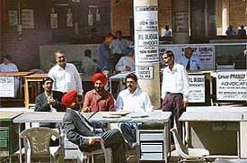 Advocates operate in the open air in the absence of proper seating arrangements.