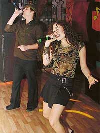 Verity Rae Martin and Paul Yiannikou of the rock band �Demand� perform at a discotheque in Sector 8, Chandigarh, on Sunday.