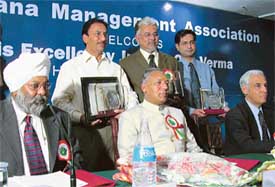 LMA awards being conferred upon Mr S.K. Sharma, Commissioner, Municipal Corporation, Ludhiana